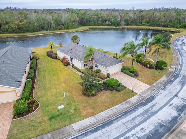 drone / aerial view with a water view