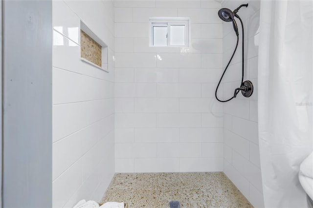 bathroom featuring walk in shower