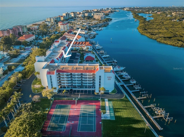 birds eye view of property featuring a water view