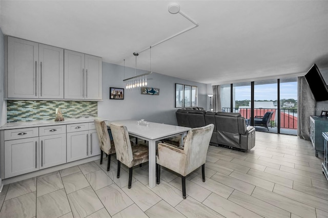 dining area with expansive windows