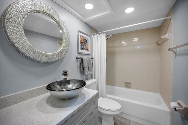 full bathroom featuring toilet, shower / tub combo, and vanity