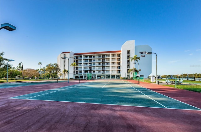 view of tennis court with basketball court