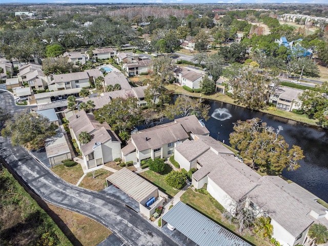 aerial view with a water view and a residential view