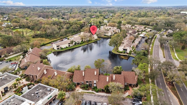 bird's eye view with a residential view and a water view