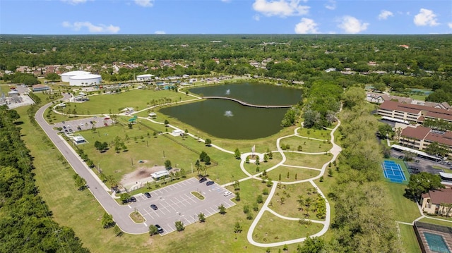 bird's eye view featuring a water view and a forest view