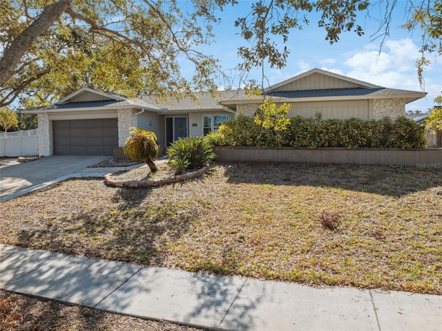 ranch-style home with a garage