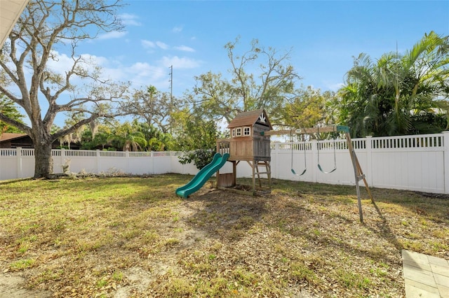 view of playground with a yard