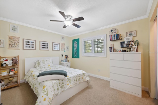 carpeted bedroom featuring ceiling fan and ornamental molding