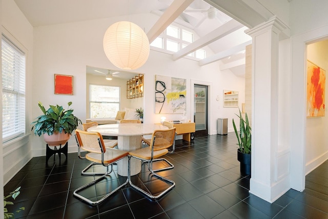 dining room featuring ornate columns, high vaulted ceiling, beamed ceiling, dark tile patterned floors, and baseboards