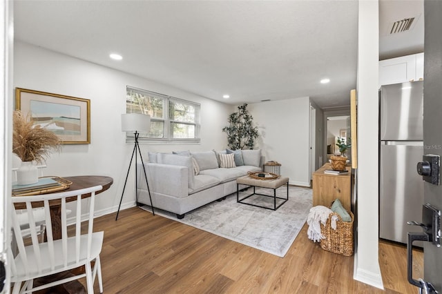 living room with wood-type flooring