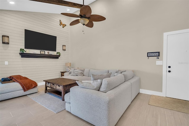 living room featuring ceiling fan, beam ceiling, light hardwood / wood-style flooring, and high vaulted ceiling