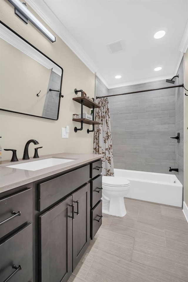 full bathroom featuring toilet, vanity, tile patterned floors, shower / bath combo, and crown molding