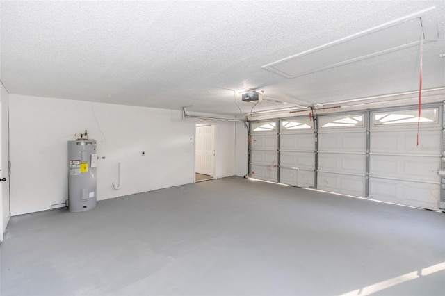 garage with a garage door opener and electric water heater