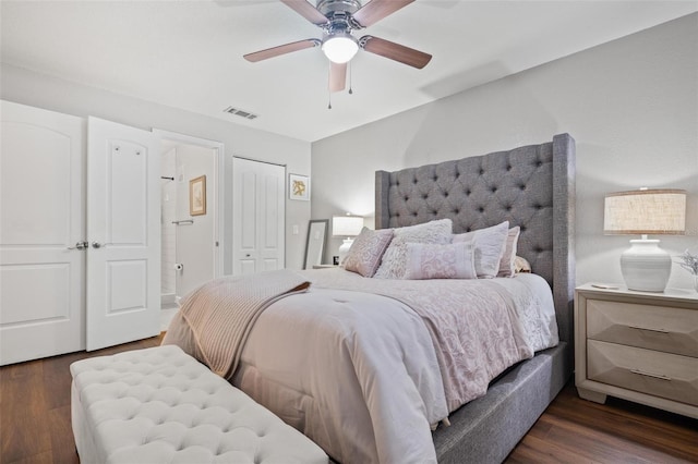 bedroom featuring ceiling fan and dark hardwood / wood-style flooring