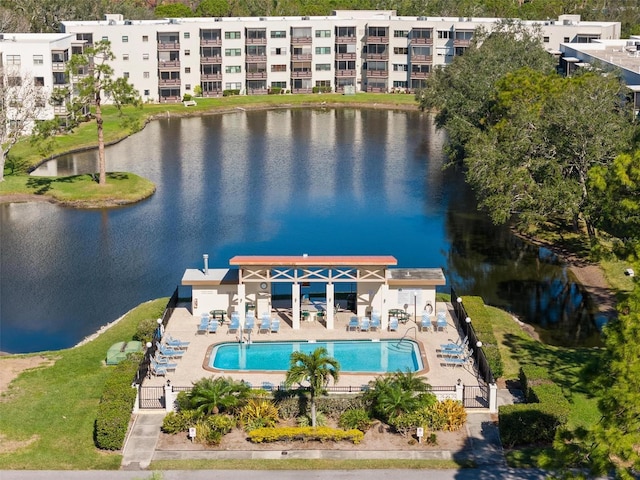 birds eye view of property featuring a water view