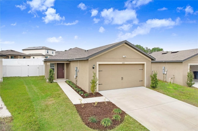 single story home with a front lawn and a garage