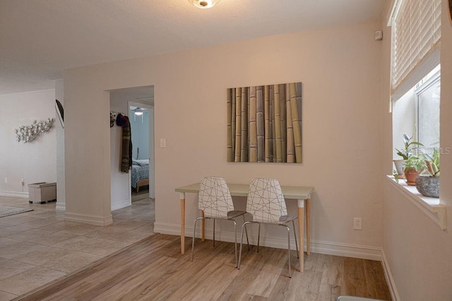 office with light hardwood / wood-style flooring