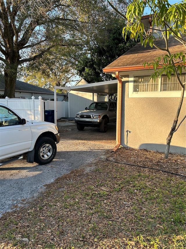 view of yard featuring a carport