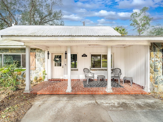 entrance to property with covered porch