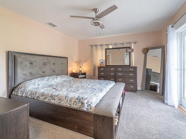 carpeted bedroom featuring ceiling fan