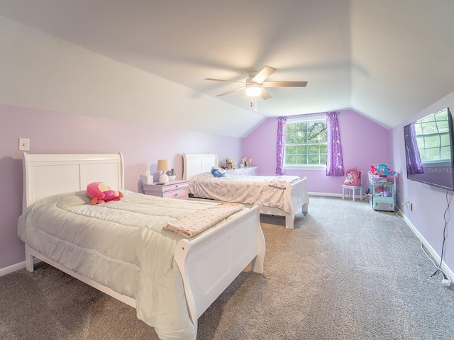 carpeted bedroom with ceiling fan and lofted ceiling