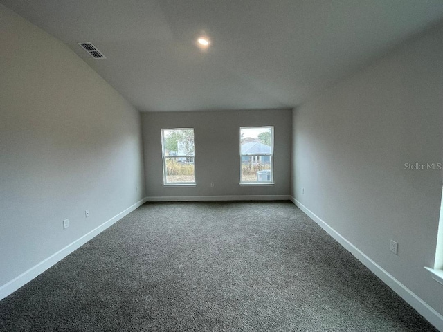 empty room featuring carpet floors