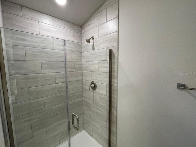 bathroom featuring an enclosed shower