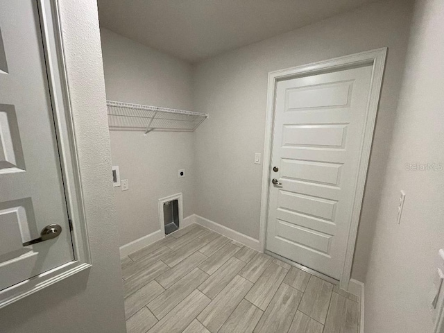 washroom featuring electric dryer hookup