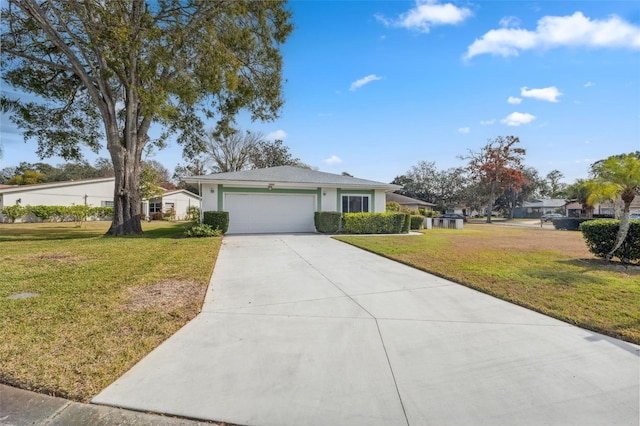 view of front of home featuring a front lawn and a garage