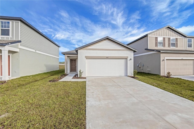 view of front of home with a garage and a front lawn