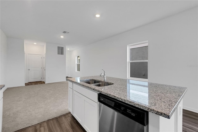 kitchen with dishwasher, sink, white cabinetry, an island with sink, and light stone counters