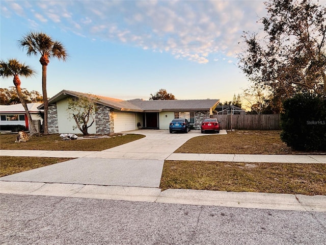 single story home with a garage