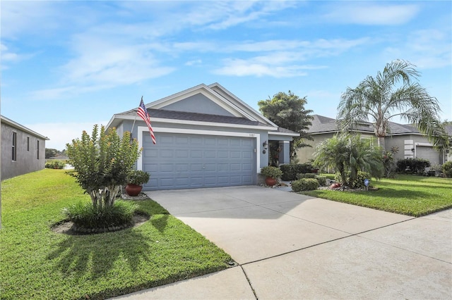 view of front facade featuring a garage and a front yard