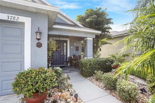 property entrance featuring a garage