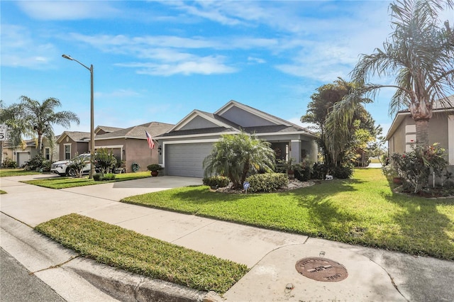 single story home with a front yard and a garage