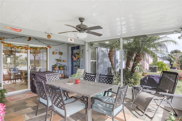 sunroom / solarium with ceiling fan and a wealth of natural light