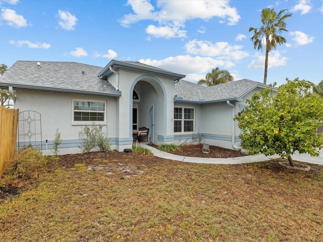 single story home with a front yard