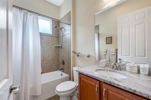 full bathroom featuring shower / bath combo, toilet, and vanity