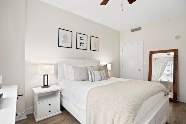 bedroom with ceiling fan and hardwood / wood-style floors