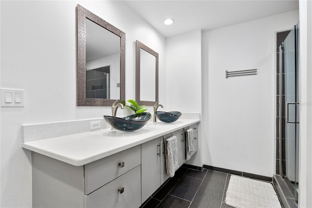 bathroom with vanity and tile patterned flooring