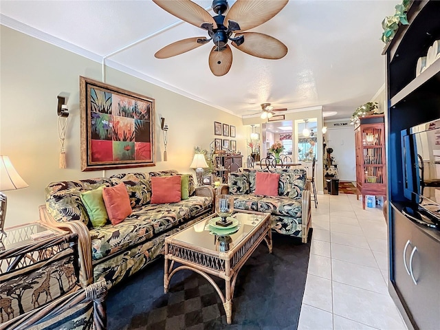 tiled living room with crown molding and ceiling fan