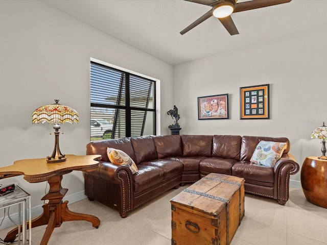 tiled living room featuring ceiling fan