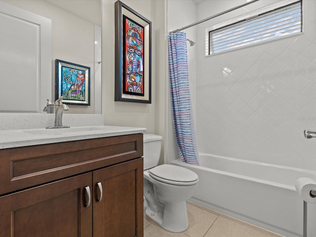 full bathroom with shower / bath combo, vanity, tile patterned floors, and toilet