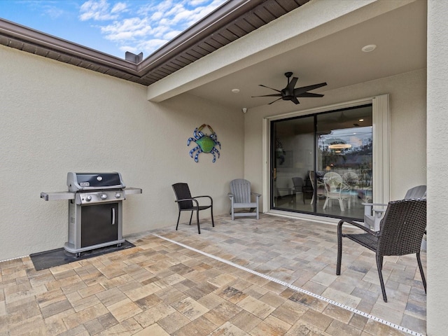 view of patio / terrace featuring grilling area and ceiling fan