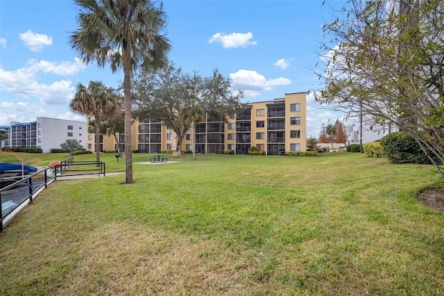 surrounding community featuring a lawn