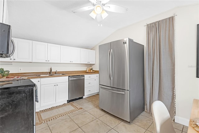 kitchen featuring ceiling fan, sink, white cabinets, and appliances with stainless steel finishes