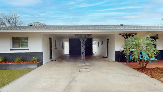 exterior space featuring a carport