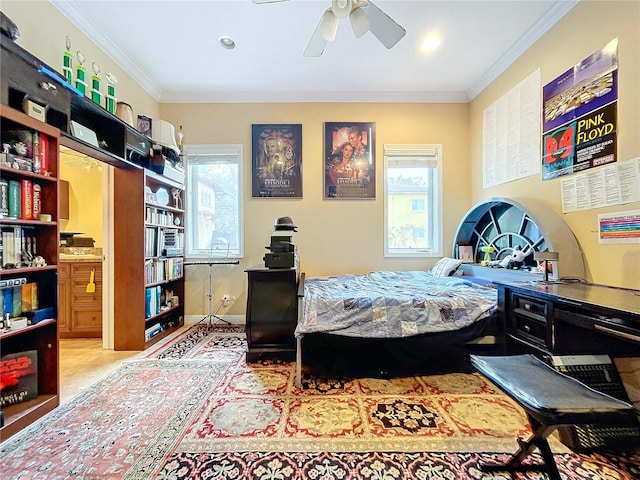 bedroom featuring ceiling fan, crown molding, and multiple windows