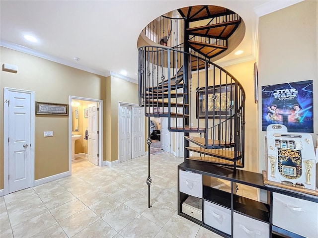 stairway featuring ornamental molding and tile patterned flooring