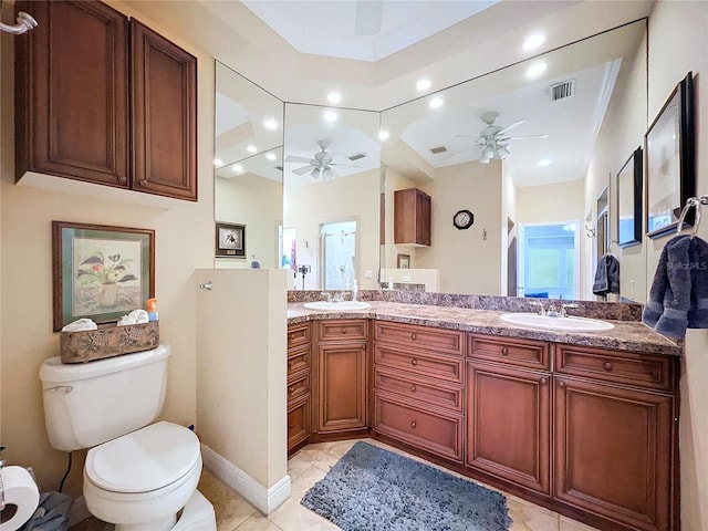 bathroom with ceiling fan, vanity, tile patterned floors, and toilet